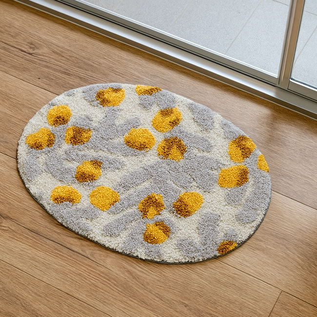  
イエローとグレーのドット柄オーバルマット／洗える玄関マット 