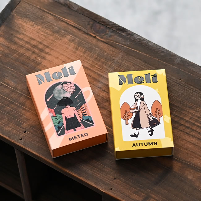 木のテーブルに置かれたMeltインセンス2種